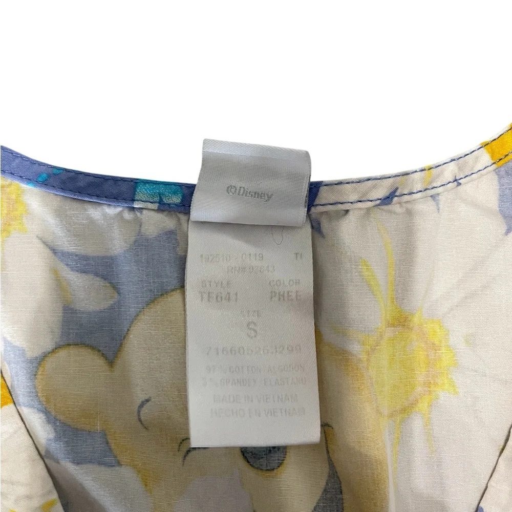 Disney Blue and Yellow Floral Print Adult Woman’s Scrub.
Size S - Picture 7 of 13